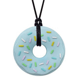 Munchables Blue Donut Chew Necklace with Colourful Sprinkles Strung on a Black Cord.