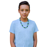 Beaded chewy worn by teen boy/young adult.