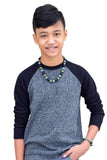 Munchables Camo Sensory Chew Necklace worn by teen boy.