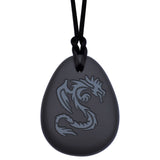 This Munchables Dragon Chew Necklace features a black silicone pendant wtih a grey dragon design. This chewelry is strung on a black cord with a break away clasp.