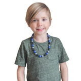 Munchables Camo Sensory Chew Necklace worn by boy.