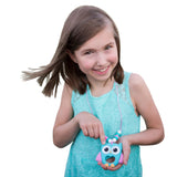 Munchables Aqua Owl Chewelry Necklace worn by a girl.