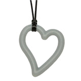 Munchables Heart Chew Necklace in gray strung on black cord.