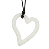 Munchables Heart Chew Necklace in white strung on black cord.