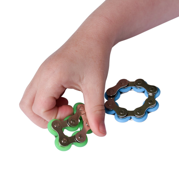 Metal Fidget Toy in boys hand.