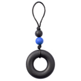 This Munchables Chewy Zipper Pull features a large black  donut bead and 2 smaller beads strung on a grey cord.