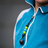 Chewable Zipper pull attached to boy's jacket.