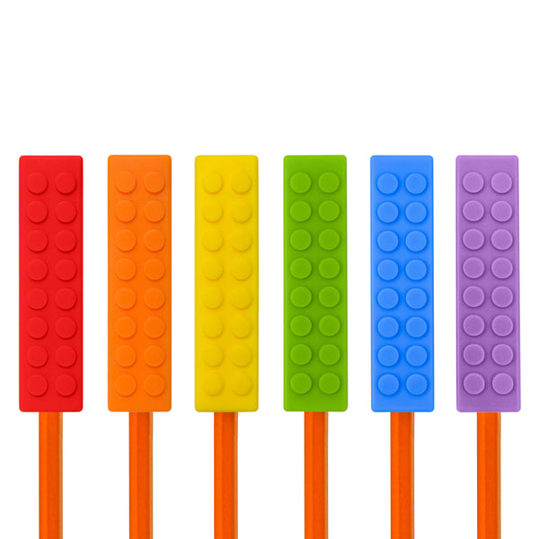 Set of 6 Munchables rainbow coloured LEGO shaped chewable pencil toppers. Red, Orange, Yellow, Green, Blue, Purple. Fits on Size #2 pencils and pens.