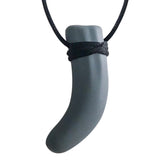 Munchables Dinosaur Tooth Chew Necklace in Gray with Black Cord Wrapped Around Top