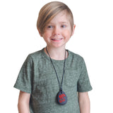 Boy with dragon anxiety necklace.