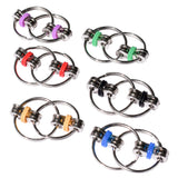 Munchables Flippy Chain Fidget Toys for stimming in purple, green, red, black, yellow and blue.