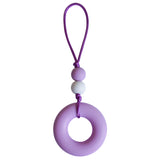 This Munchables Chewy Zipper Pull features a large purple donut bead and 2 smaller beads strung on a grey cord.