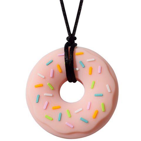 Munchables Pink Donut Chew Necklace with Colourful Sprinkles Strung on a Black Cord.