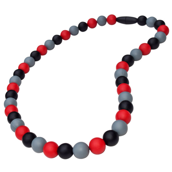 Munchables Lava Chew Necklace features red, black and gray silicone chewy beads and a black breakaway clasp.