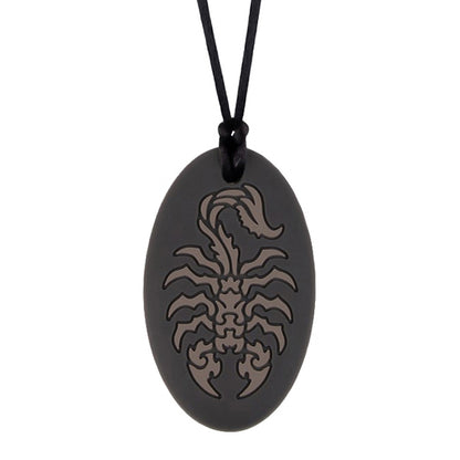 Munchables black oval shaped chew necklace with gray scorpion design.