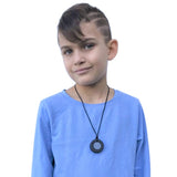 Munchables Tire Chewelry Necklace worn by a teen boy.