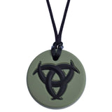 Munchables Celtic Chew Necklace with dark green background and a black raised design. 