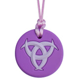 Munchables Celtic Chew Necklace with a purple background and a lighter purple raised design.