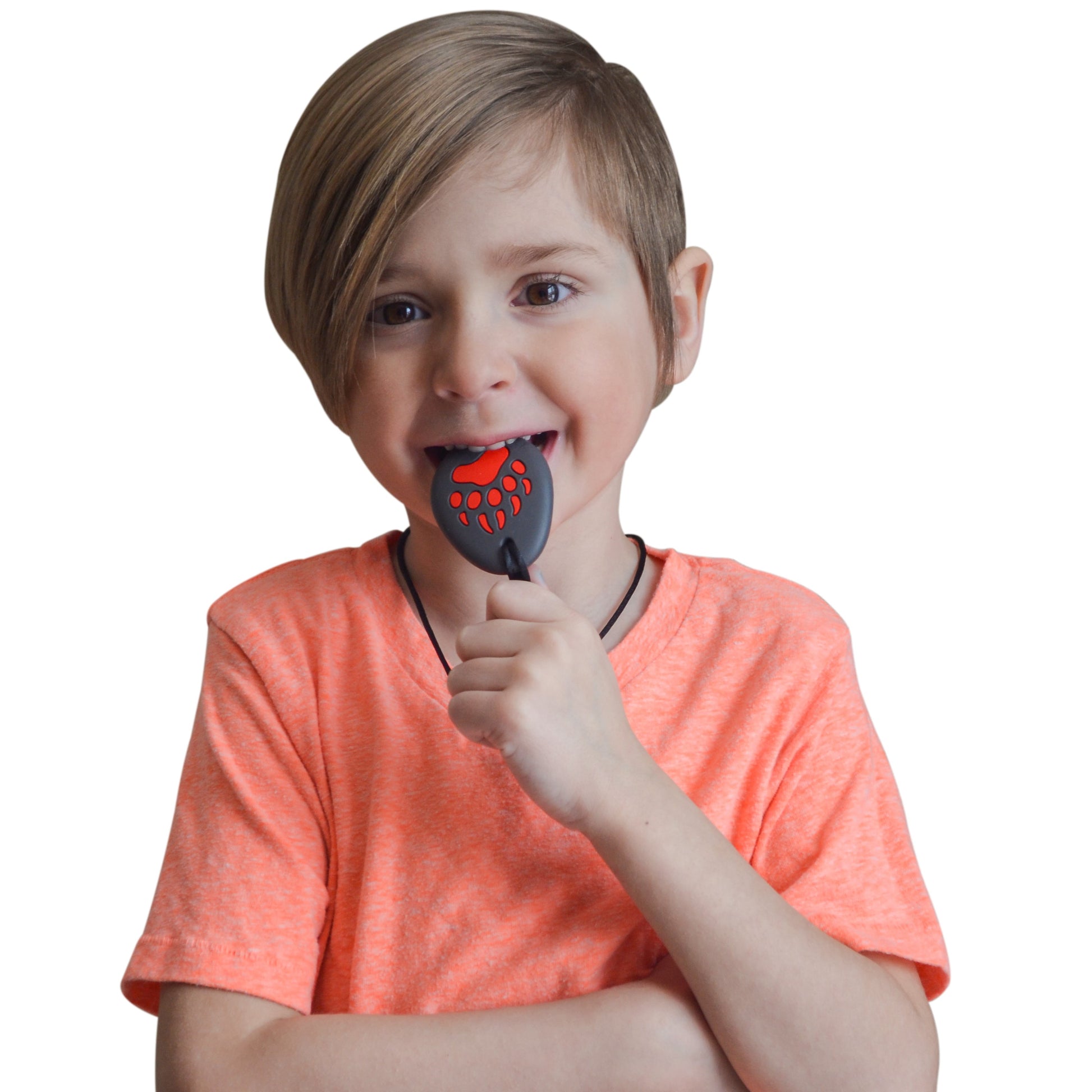 Munchables Bear Paw Chewelry chewed on by young boy.
