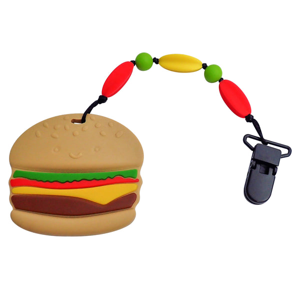 Munchables hamburger hand held chew toy with chewable red, green and yellow coloured beads on lanyard. Features a clip to attach to clothing.
