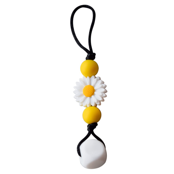 Munchables Daisy Chewable Zipper pull has a large white silicone bead, a white daisy and 2 yellow round beads.
